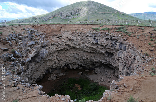 Meteor Pit, located in Doğubeyazıt city of Turkey, is the second largest meteor pit in the world. It was formed as a result of a meteor impact in the 19th century. photo