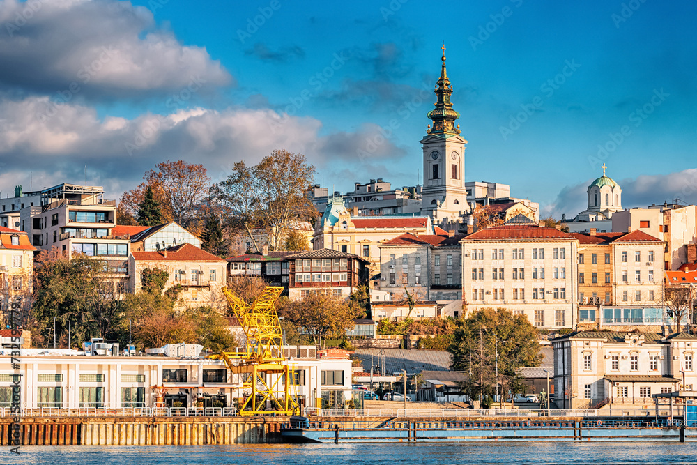 Fototapeta premium Belgrade's skyline boasts historic churches and modern architecture, framed by the picturesque rivers Danube and Sava.