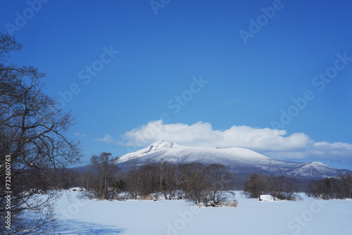 A view of the park in winter after it snows.