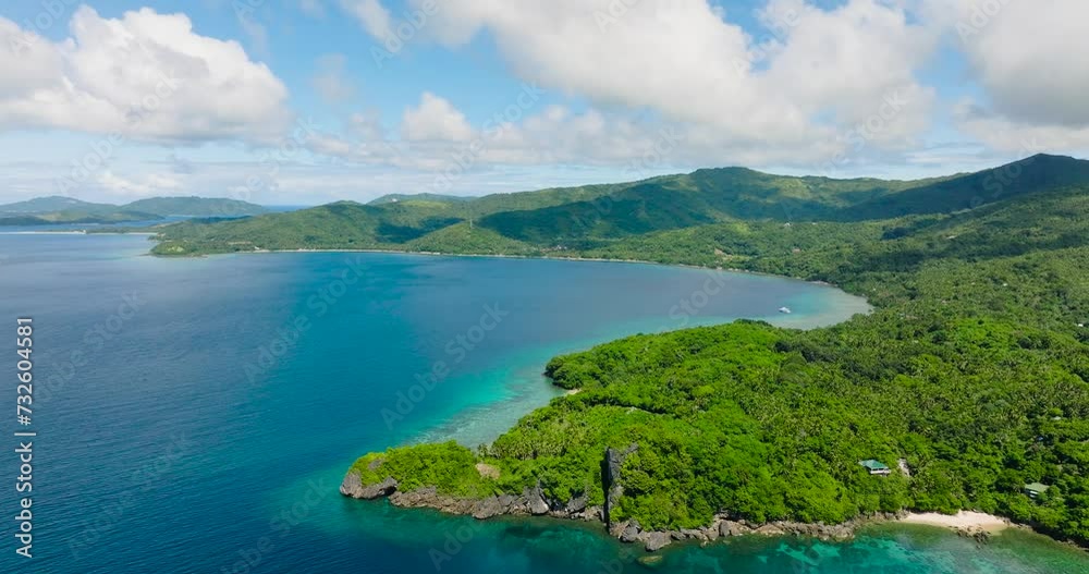 Romblon Islands surrounded by blue sea. Blue sky and clouds. Romblon. Philippines. Romblon Islands surrounded by blue sea. Blue sky and clouds. Romblon. Philippines.