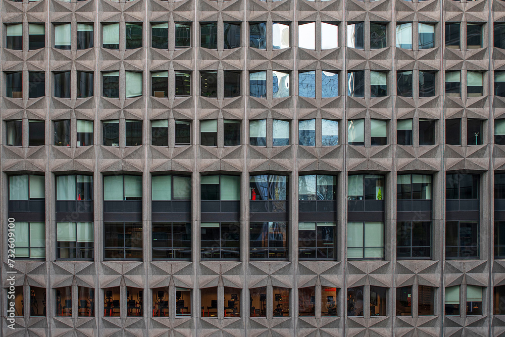 Texture of a modern building with glass façades in the 