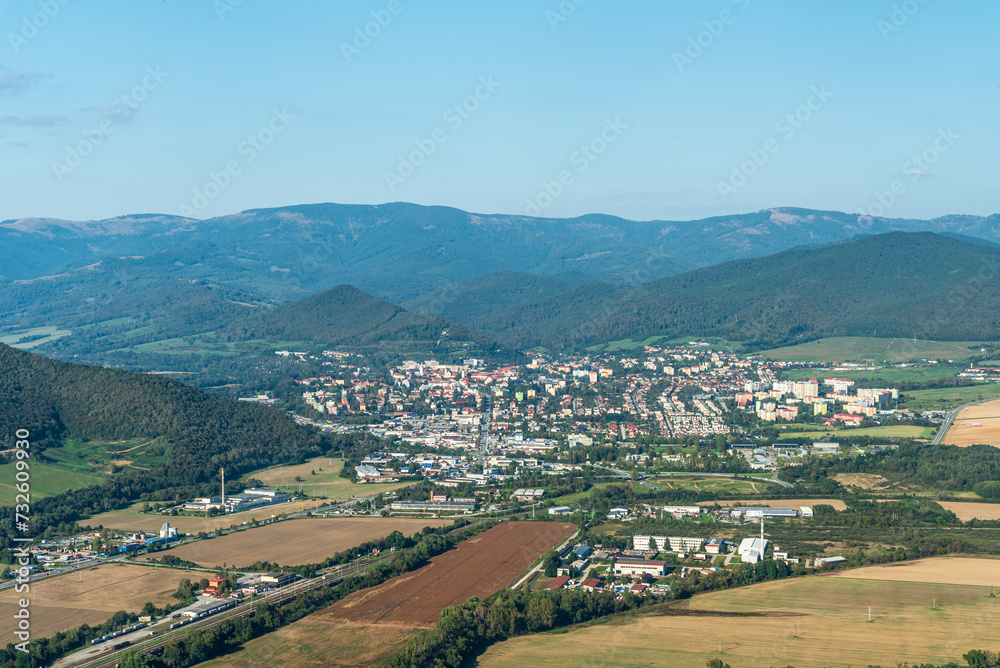 Roznava city with hills of Slovenske rudohorie above from Brzotinska skala viewpoint in Slovakia