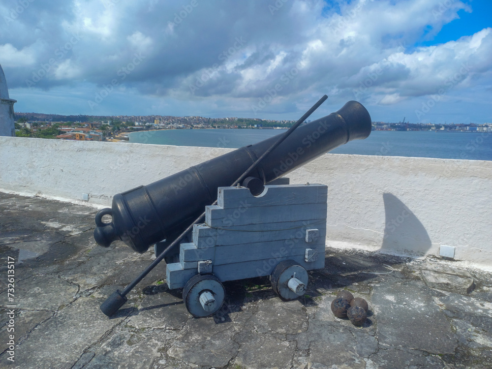 antique cannon with artillery, defence weapon of an ancient fortress, castle