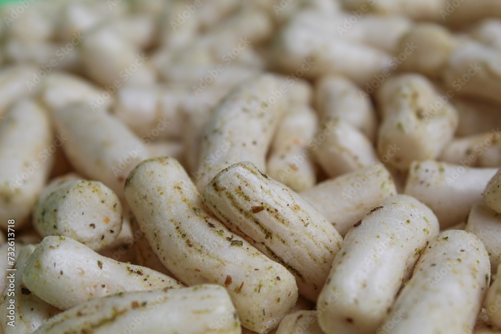 Fish crackers in small cylinder shape. Snack from Indonesia, called krupuk ikan tongkol Fish crackers in small cylinder shape. Snack from Indonesia, called krupuk ikan tongkol