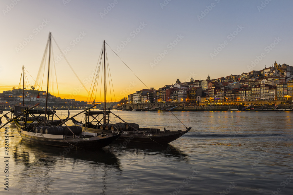 Sunset over Ribeira district and the Douro with Rabelos, Unesco World Heritage Site, OPorto, Portugal