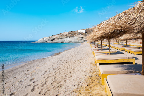 Lia Beach, wild and free beach in the south of Mykonos, Greece. Pristine bay with blue sea and crystal water, famous for naturism and Scuba diving school, peaceful and quiet. photo