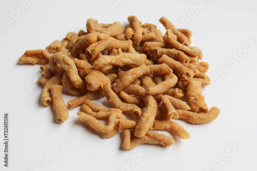 Crispy fried chicken intestines, isolated on white background