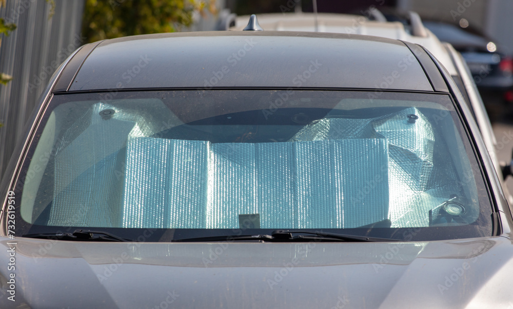 Reflective sun protection on car windshield
