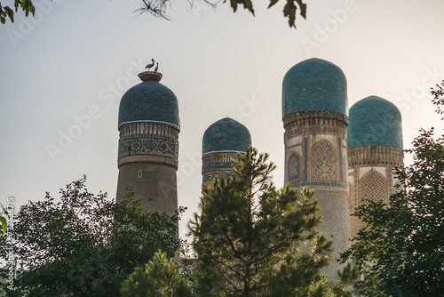 Photography Exterior of Chor Minor Madrasah in the ancient city of Bukhara in Uzbekistan, or