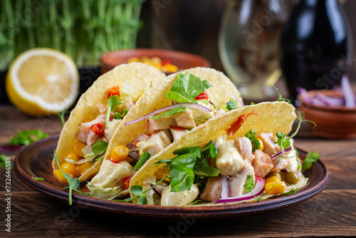 Mexican tacos with chicken meat, corn and salsa. Healthy tacos. Diet menu. Mexican taco.