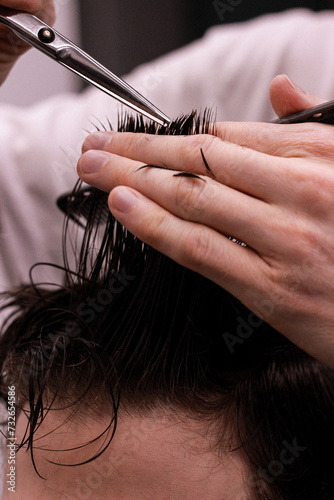 hairdresser cutting hair