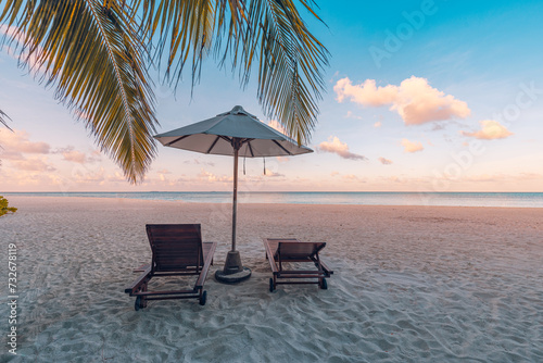 Amazing beach. Couple chairs umbrella sandy beach sea. Luxury summer holiday vacation resort hotel tourism. Inspire tropical landscape. Tranquil romantic relax sea sky beautiful honeymoon landscape