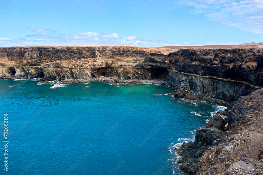 Caleta Negra (Black Bay) landscape on the coast of the Atlantic Ocean in Ajuy, Fuerteventura, Spain, Atlantic