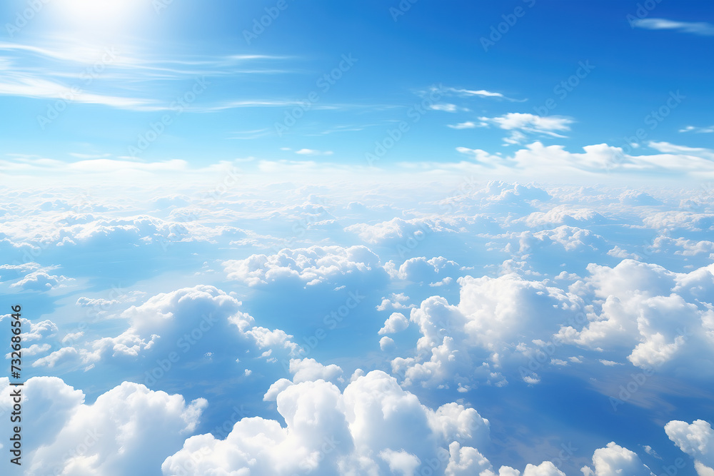 An aerial view of clouds and sky observed from an airplane.