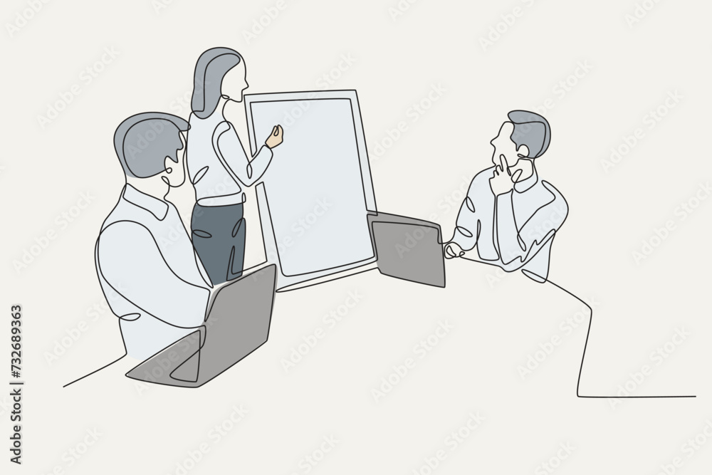 Three employees are having a meeting with the boss