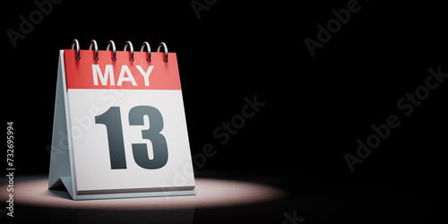 May 13 Calendar Spotlighted on Black Background