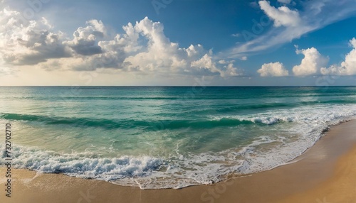 tropical beach panorama seascape with a wide horizon showcasing the beautiful expanse of the sky meeting the sea