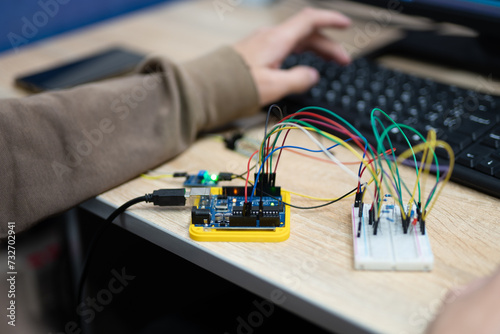 an engineer is engaged in the development and layout of electrical circuits