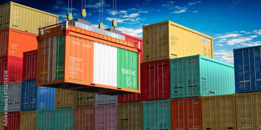 Fototapeta premium Freight shipping container with flag of Ivory Coast on crane hook - 3D illustration