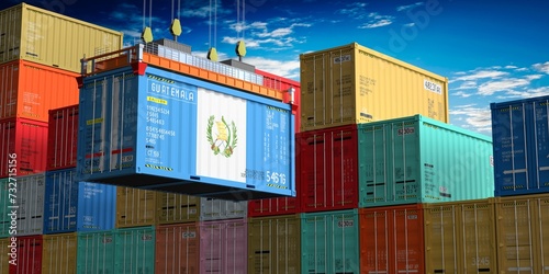 Freight shipping container with flag of Guatemala on crane hook - 3D illustration photo