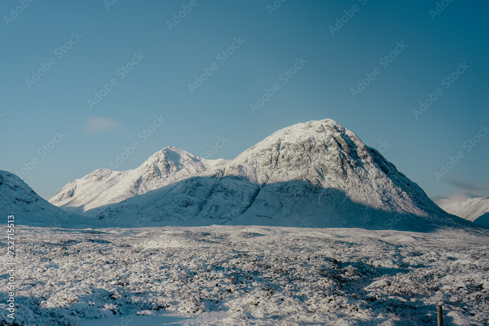 Snow-covered Buachaille Etive Mor, an iconic mountain in the Scottish highlands