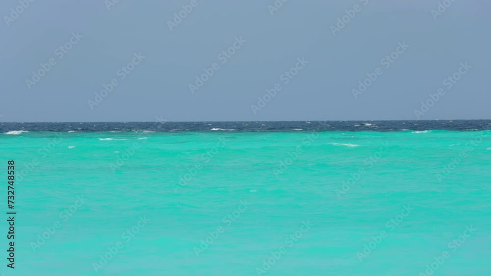 Beach blue sky seascape ocean horizon island. Scene cloudscape wave sea splashing sandy sunny. Landscape summer beach sea space area. surface closeup shore. Beach blue sky seascape ocean horizon island. Scene cloudscape wave sea splashing sandy sunny. Landscape summer beach sea space area. surface closeup shore.