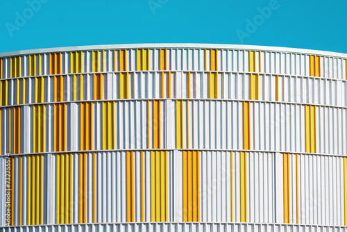 Modern architecture. Close up of blue and yellow building.