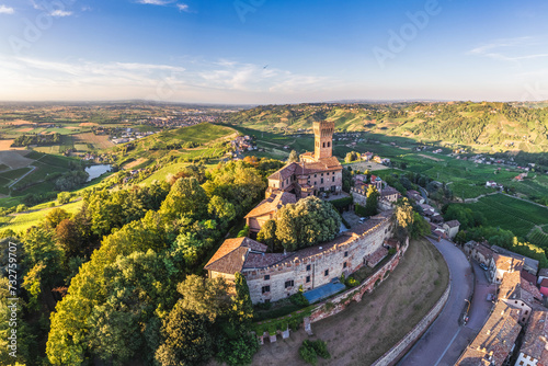 Aerial view of Cigognola Castle with his vineyard in background, Oltrepo Pavese, Pavia, Lombardy, Italy photo