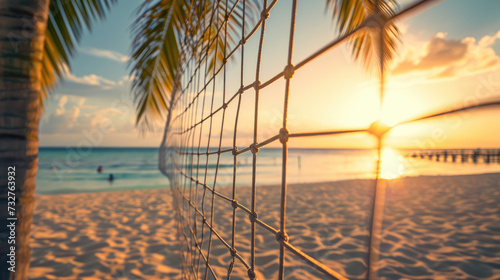 Summer holiday background. Beach volleyball. Beach volleyball net against the backdrop of a tropical sea sunset. photo