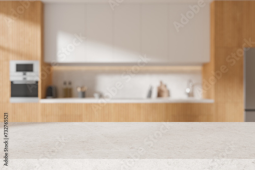 Quartz countertop on background of kitchen interior with kitchenware. Mockup