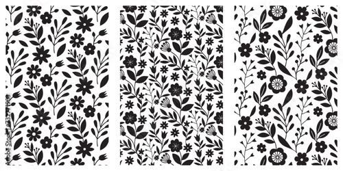  Floral seamless pattern set. Black doodle branches, flowers, leaves and berries on white background. Botanical monochrome design. Vector illustration.