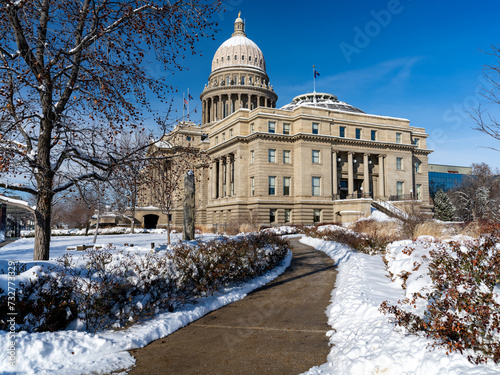 Idaho state capita in winter with snow shoveled walkway photo