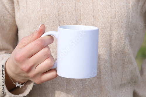 person with cup of coffee