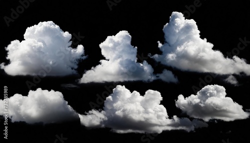 collection of whtie clouds isolated on black background photo