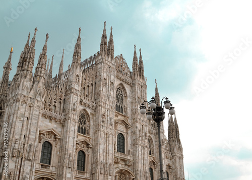 Front facade on the Metropolitan Cathedral-Basilica of the Nativity of Saint Mary (Duomo Milano) in Milan, Lombardy, Italy.