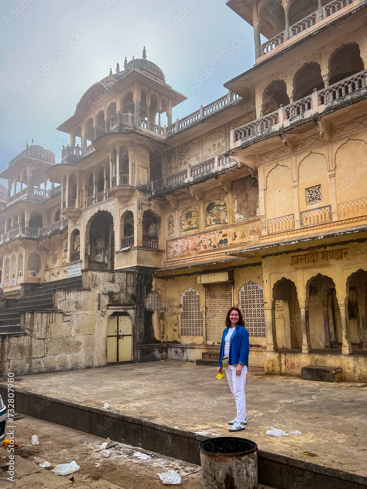 Galta Ji, India - January 4, 2024: A female tourist near Galta Mandir palace