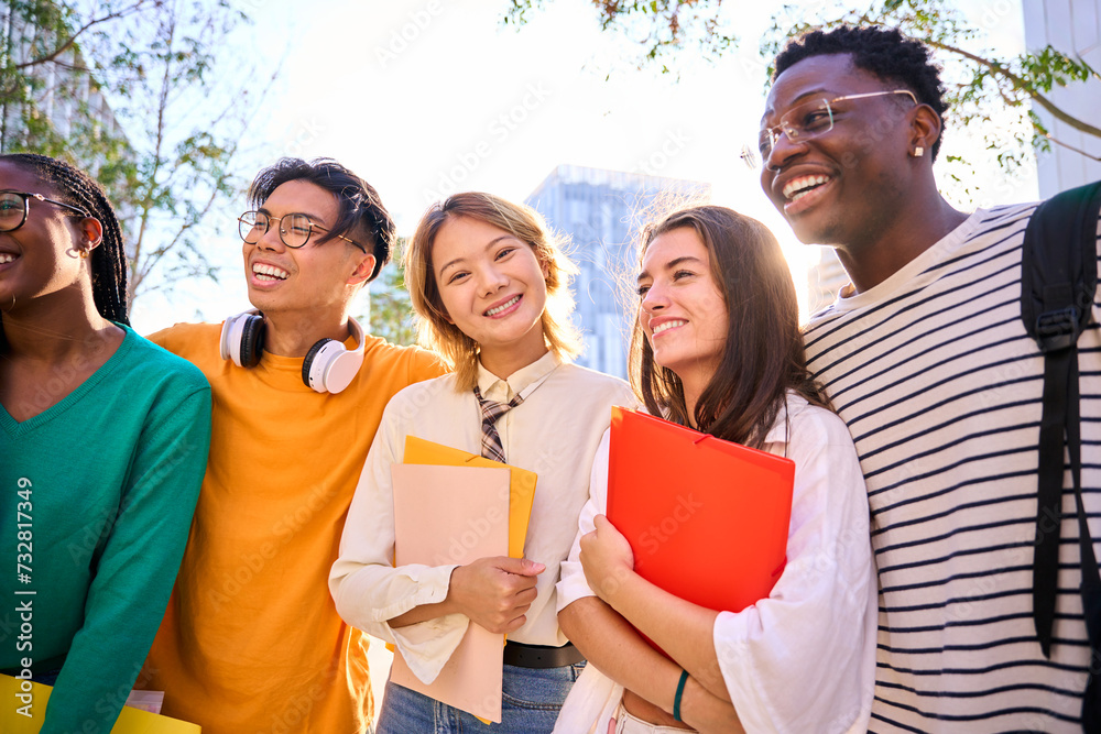 Happy Asian girl with multiracial classmates university students posing ...