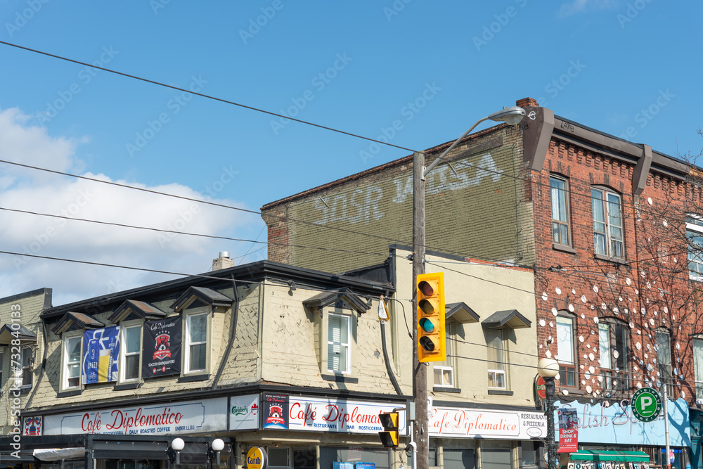 exterior building and sign of Cafe Diplomatico Restaurant & Pizzeria
