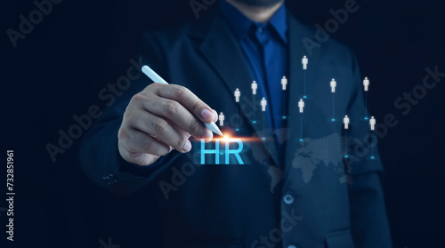 HR management, Human resources management concept, Technology and network concept. CRM, HR word button. Businessman presses hr icon on virtual screen on background of network business success sign.