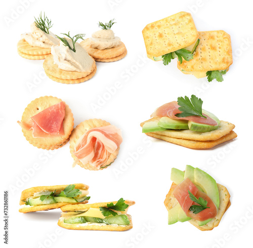 Delicious crackers with different toppings isolated on white, set