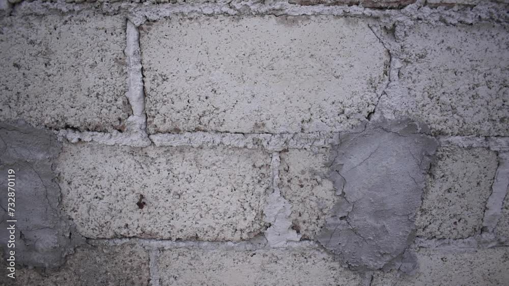 Textura de una pared de ladrillos de hormigón color gris ideal para fondos Textura de una pared de ladrillos de hormigón color gris ideal para fondos