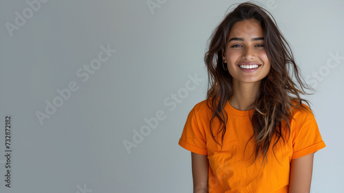 Indian woman wear orange casual t-shirt smile isolated