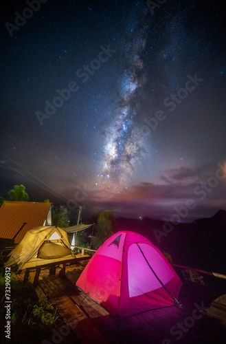 Tent camping with sunset sky and milky way background