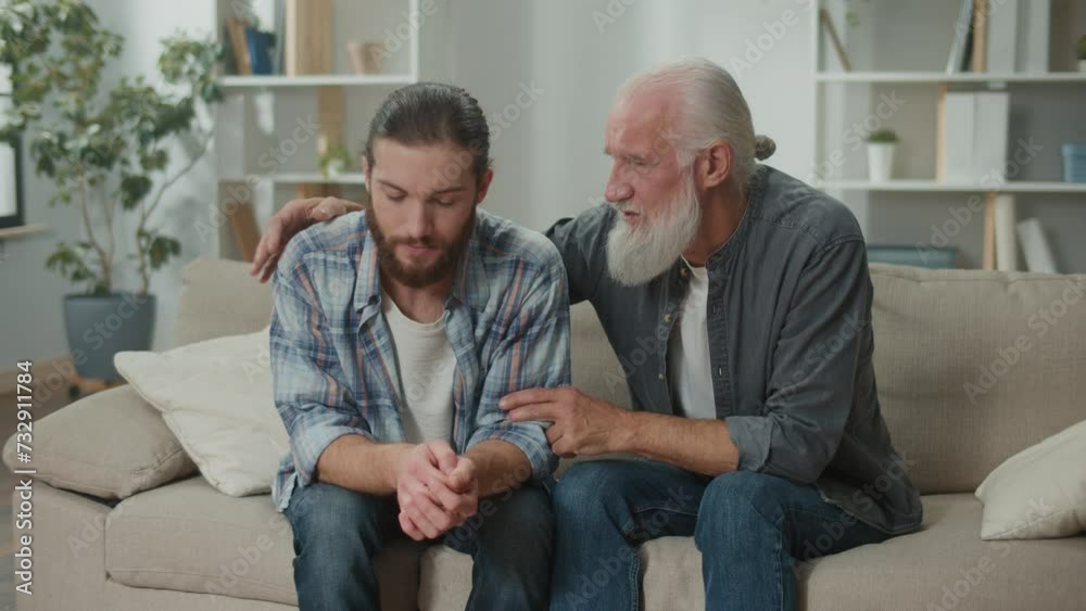 Deep conversation between generations young man and elder on the couch discuss life, experience exchange, heartfelt communication, emotional support, understanding differences mentoring, family values Deep conversation between generations young man and elder on the couch discuss life, experience exchange, heartfelt communication, emotional support, understanding differences mentoring, family values