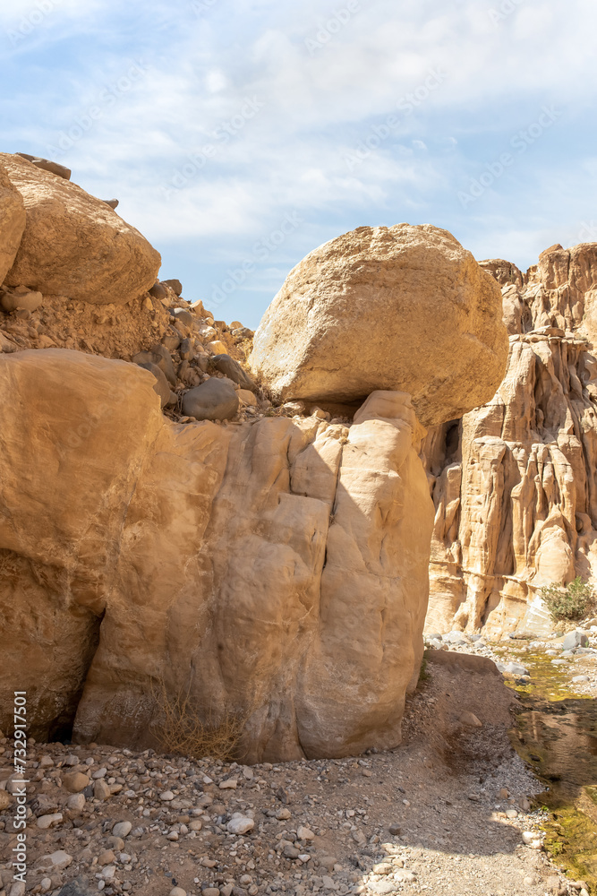 Huge boulders on tourist route of the gorge Wadi Al Ghuwayr or An Nakhil and the wadi Al Dathneh near Amman in Jordan