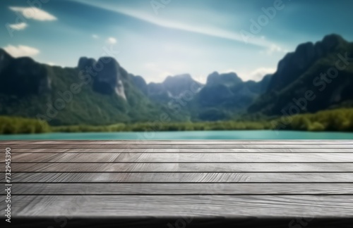 Empty old wooden table in front of blurred background of the lake  blue sky
