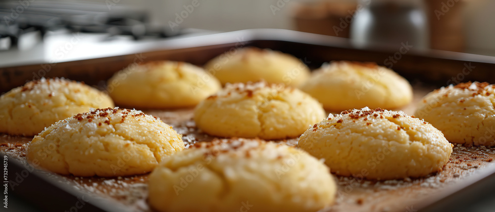 a tray of freshly baked cookies on a counter top