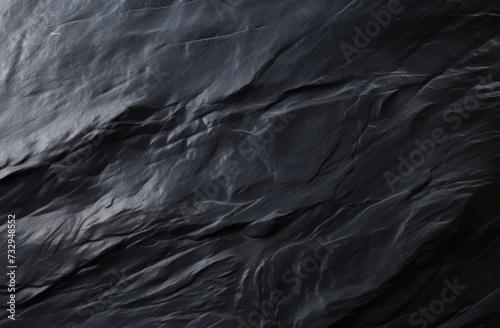 Black or dark gray rough stone wall texture background © Riz