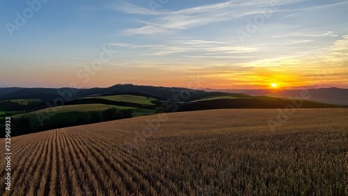 Beautiful view on green hills at sunrise  summer rural landscape