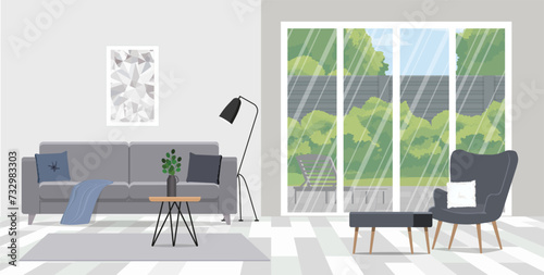 Armchair with pillow and stool in living room interior